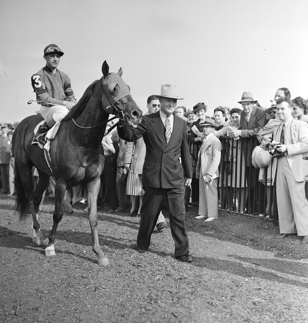 Eddie Arcaro on Whirlaway with Horace A. Jimmy Jones after winning the Belmont Stakes